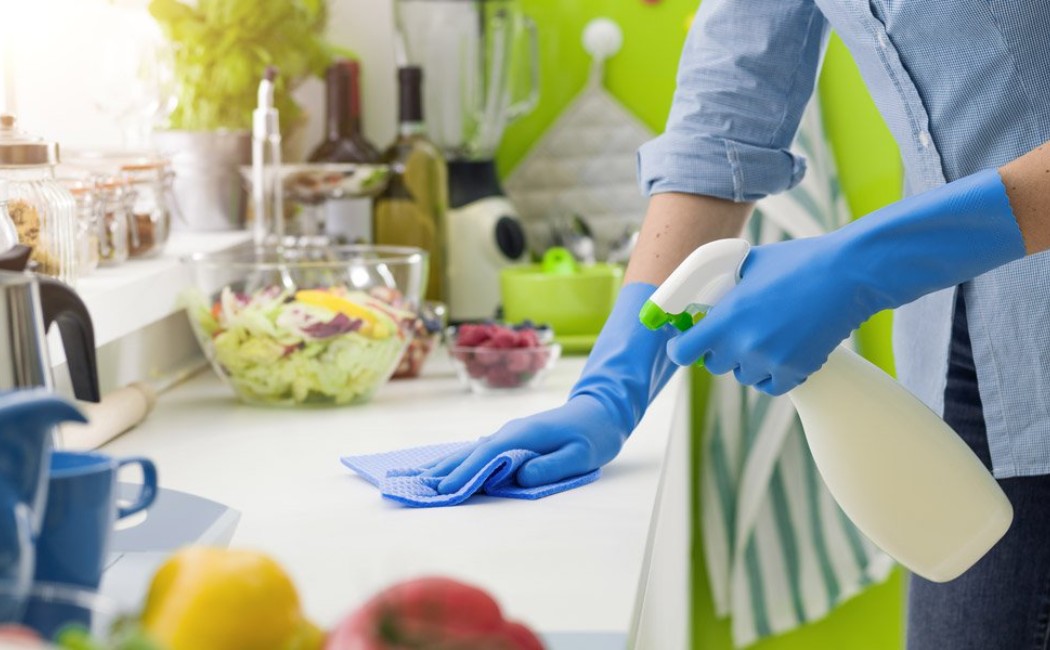 Kitchen Cleaning for Sparkling Modern Kitchens. Kitchen cleaning specialist ensuring sparkling clean countertops and superior hygiene in a modern residential kitchen.